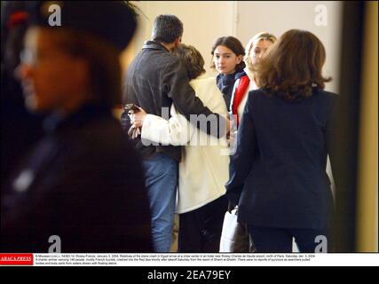 © Mousse/ABACA. 54362-14. Roissy-France, January 3, 2004. Relatives of the plane crash in Egypt arrive at a crisis center in an hotel near Roissy Charles de Gaulle airport, north of Paris, Saturday Jan. 3, 2004. A charter airliner carrying 148 people, mostly French tourists, crashed into the Red Sea shortly after takeoff Saturday from the resort of Sharm El Sheikh. There were no reports of survivors as searchers pulled bodies and body parts from waters strewn with floating debris. Stock Photo