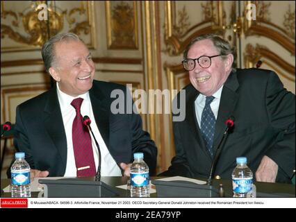 © Mousse/ABACA. 54596-3. Alfortville-France, November 21 2003. OECD Secretary-General Donald Johnston received the Romanian President Ion Iliescu. Stock Photo