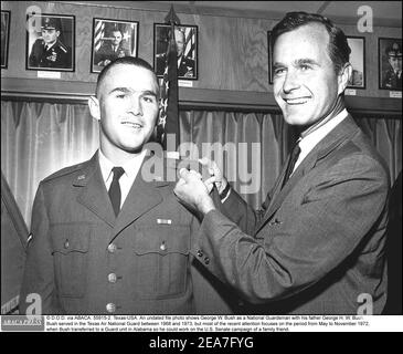 © D.O.D. via ABACA. 55915-2. Texas-USA. An undated file photo shows George W. Bush as a National Guardsman with his father George H. W. Bush. Bush served in the Texas Air National Guard between 1968 and 1973, but most of the recent attention focuses on the period from May to November 1972, when Bush transferred to a Guard unit in Alabama so he could work on the U.S. Senate campaign of a family friend. Stock Photo