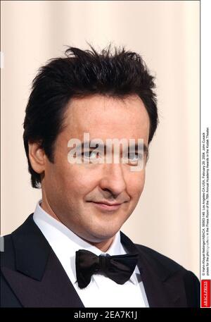 John Cusack poses for the photographers in the Press Room of the 76th Annual Academy Awards in the Kodak Theater, Los Angeles, CA. February 29, 2004 (Pictured : John Cusack) Photo by Hahn-Khayat-Nebinger/ABACA Stock Photo