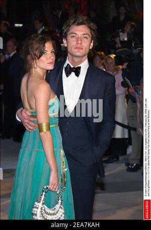 Sienna Miller and Jude Law attend the Vanity Fair Post Oscars Party at the Mortons. Los Angeles, February 29, 2004. (Pictured: Sienna Miller, Jude Law). Photo by Hahn-Khayat-Nebinger/Abaca. Stock Photo