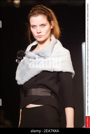 © Java/ABACA. 56660. Paris-France, March 2, 2004. A model displays a creation by Dice Kayek for her Fall-Winter 2004-2005 Ready-to-Wear collection presentation. Stock Photo