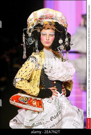 JAVA/ABACA. 56854. Paris-France, March 6, 2004. A model displays a creation  by John Galliano for his Fall-Winter 2004-2005 Ready-to-Wear collection  presentation Stock Photo - Alamy