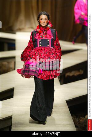 © Java/ABACA. 56908-14. Paris-France, March 8, 2004. A model displays a creation by fashion house Kenzo at the presentation of its Fall-Winter 2004-2005 Ready-to-Wear collection. Stock Photo