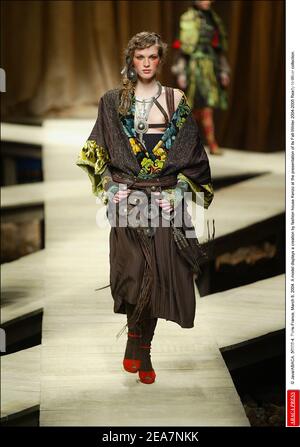 © Java/ABACA. 56908-4. Paris-France, March 8, 2004. A model displays a creation by fashion house Kenzo at the presentation of its Fall-Winter 2004-2005 Ready-to-Wear collection. Stock Photo