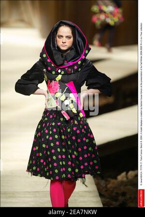 © Java/ABACA. 56908-15. Paris-France, March 8, 2004. A model displays a creation by fashion house Kenzo at the presentation of its Fall-Winter 2004-2005 Ready-to-Wear collection. Stock Photo