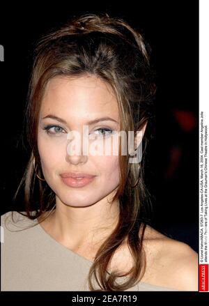 © Lionel Hahn/ABACA. 57263-7. Los Angeles-CA-USA, March 16, 2004. Cast member Angelina Jolie attends the World Premiere of Taking Lives at the Grauman's Chinese Theatre in Hollywood. Stock Photo