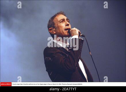 French singer Alain Chamfort performs live on the Cigale stage in Paris on March 24, 2004. Photo by Giancarlo Gorassini/ABACA. Stock Photo