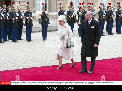 Britain's Queen Elizabeth II and The Duke of Edinburgh arrive at the Elysee palace in Paris on april 5, 2004. Her Majesty begins on Monday a three-day state visit to mark the centenary of the Entente Cordiale. Photo by Mousse-Hounsfield/ABACA. Stock Photo