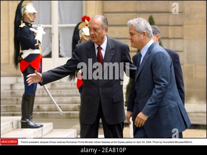 French president Jacques Chirac receives Romanian Prime Minister Adrian Nastase at the Elysee palace on April 29, 2004. Photo by Hounsfield-Mousse/ABACA. Stock Photo