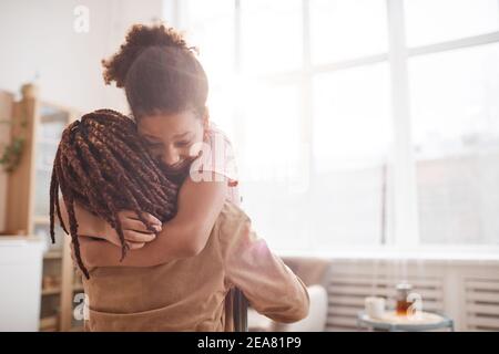 Minimal waist up portrait of affectionate couple in kitchen gazing at each  other blank area 27185919 Stock Photo at Vecteezy
