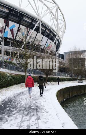 London, UK- February 2021 : London Stadium, Queen Elizabeth Olympic Park, in snow. Stock Photo
