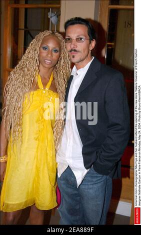American born choreographer Mia Frye and her husband Michel Ressiga attend the opening of the new store 'Galerie Vivienne' of French fashion designer Nathalie Garcon in Paris-France on Monday, May 24, 2004. Photo by Bruno Klein/ABACA. Stock Photo
