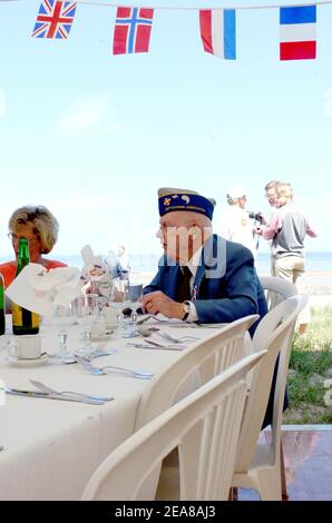 D-Day veterans of the 29th Infantry Division attend lunch at Saint Laurent, 3rd June 2004. The place, also known as Omaha Beach in Normandy, is the site of the D-Day Overlord Battle that took place 60 years ago. Photo by Ammar Abd Rabbo/ABACA for The Philadelphia Inquirer Stock Photo