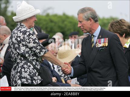 HRH the Prince of Wales inaugurates the British Garden of Remembrance in front of the veterans from Colleville-Montgomery in Caen-France on Saturday, June 5, 2004. The visit was part of commemorations to mark the 60th anniversary of D-Day. Photo by Mousse-Hounsfield-Abd Rabbo-Nebinger/ABACA. Stock Photo