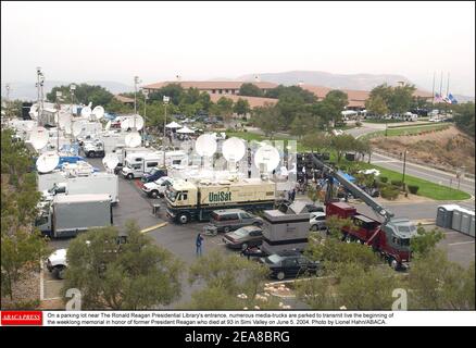 On a parking lot near The Ronald Reagan Presidential Library's entrance, numerous media-trucks are parked to transmit live the beginning of the weeklong memorial in honor of former President Reagan who died at 93 in Simi Valley on June 5, 2004. Photo by Lionel Hahn/ABACA. Stock Photo