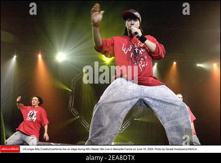 US singer Billy Crawford performs live on stage during NRJ Master Mix Live in Marseille-France on June 16, 2004. Photo by Gerald Holubowicz/ABACA. Stock Photo