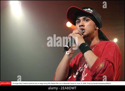 US singer Billy Crawford performs live on stage during NRJ Master Mix Live in Marseille-France on June 16, 2004. Photo by Gerald Holubowicz/ABACA. Stock Photo