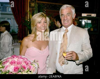 French actor Jean-Paul Belmondo and his wife Natti pictured during the opening ceremony of the 2nd Festival Paris Cinema at the Hotel de Ville (City Hall) in Paris-France on June 28, 2004. On the occasion Belmondo has been honored with the Medal of the City of Paris by Mayor Bertrand Delanoe. Photo by Laurent Zabulon/ABACA. Stock Photo