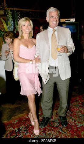 French actor Jean-Paul Belmondo and his wife Natti pictured during the opening ceremony of the 2nd Festival Paris Cinema at the Hotel de Ville (City Hall) in Paris-France on June 28, 2004. On the occasion Belmondo has been honored with the Medal of the City of Paris by Mayor Bertrand Delanoe. Photo by Laurent Zabulon/ABACA. Stock Photo