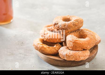 Homemade donuts sugar glazed on a stone background Stock Photo