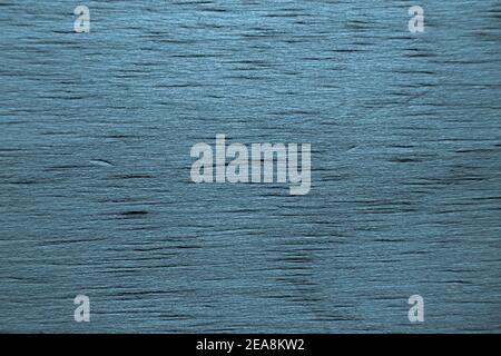 Blue toned black and white wooden background. Stock Photo