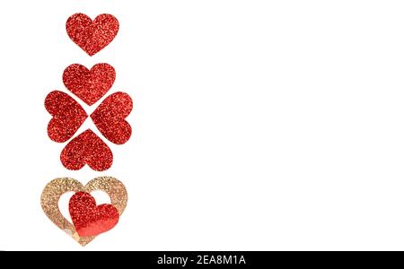 Pattern of red and gold hearts on a white background. Valentine's day concept. Stock Photo