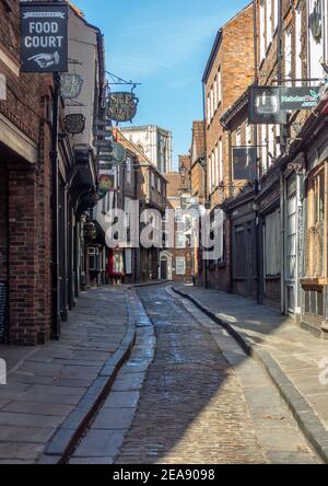 York, Yorkshire, UK, 01/02/2021 - The Shambles in York with no people during Covid lockdown. Cobbled narrow street. Stock Photo