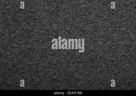 Heather dark grey knitted fabric made of melange mixed yarn textured background Stock Photo
