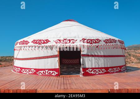 A Yurt is a portable tent house that occupies a Central place in the culture of Central Asian nomadic peoples. Ethnic and folk patterns for home decor Stock Photo