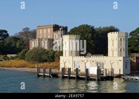 Brownsea Castle, family pier and landing stage, Brownsea Island, Poole Harbour, Dorset, UK, December. Stock Photo