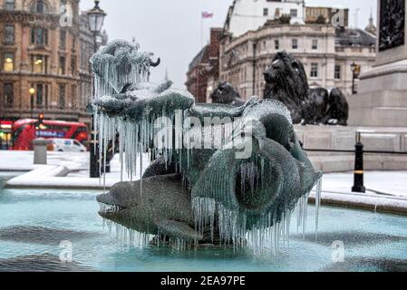 London, UK. 08th Feb, 2021. Icicles form on a statue that is part of the fountains in Trafalgar Square during storm Darcy. Credit: SOPA Images Limited/Alamy Live News Stock Photo