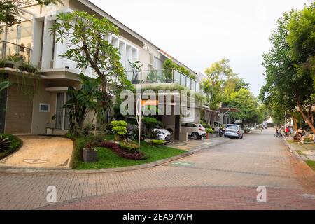 Jakarta, Indonesia - June 24, 2020: A street in a typical middle class Indonesian housing complex or compound in Jakarta Stock Photo