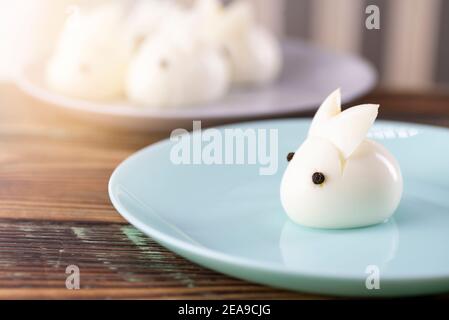 Funny bunny made of boiled eggs, Easter table decoration, Easter decor and serving. Stock Photo