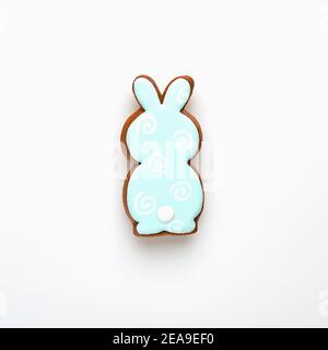 Easter symbol blue bunny gingerbread isolated on white. Top view. Stock Photo