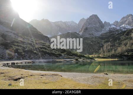 Austria, Tyrol, Ehrwald, Seebensee, Zugspitze, mirroring, water surface, Zugspitz massif, lake, mountain lake, mountains, alps, Wetterstein Mountains, mountain landscape, mountain landscape, idyll, mountain massif, mountain massif, heaven, rock, mountain lake, water, tourism, deserted, late autumn, Nature, Stock Photo