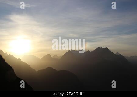 Sunset towards the Wetterstein Mountains, Zugspitze in the background, taken on the Gamseck above the Mittenwalder Hut Stock Photo