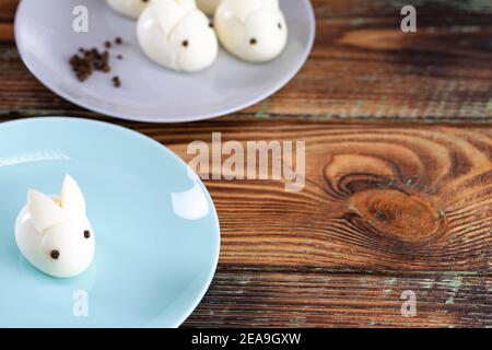 Funny bunny made of boiled eggs, Easter table decoration, Easter decor and serving. Stock Photo