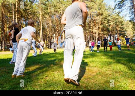 GRODNO, BELARUS - SEP 09: Group of capoeira students with master teacher in FICAG school in Grodno, Belarus at September 09, 2016 Stock Photo