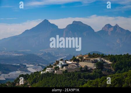 Hilltop urbanisation, seen from the Bernia Ridge above Benidorm, on the Costa Blanca, Spain Stock Photo