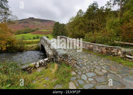 Stone bridge over the River Derwent Barrowdale  Lake District Cumbria Stock Photo