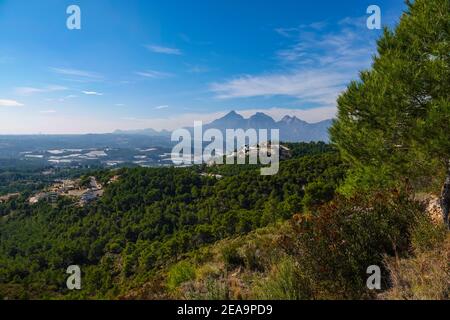 Hilltop urbanisation, seen from the Bernia Ridge above Benidorm, on the Costa Blanca, Spain Stock Photo