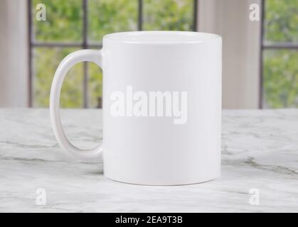 White blank coffee mug to add custom design/quote. Stock Photo by  ©Capdesign 136485538