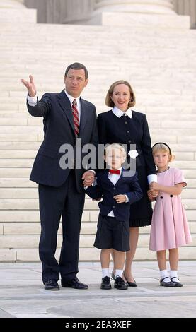 Chief Justice John G. Roberts poses with his family on the front steps ...