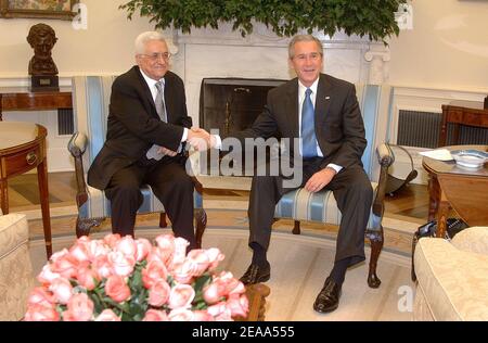 U.S. President George W. Bush (R) shakes hands with the President of the Palestinian Authority Mahmoud Abbas during their meeting in the Oval Office at the White House in Washington, DC, USA, on October 20, 2005. Photo by Olivier Douliery/ABACAPRESS.COM Stock Photo