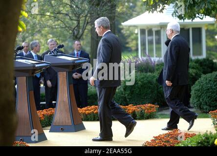 U.S. president George W. Bush (L) and the president of the Palestinian Authority Mahmoud Abbas arrive for a joint press conference in the Roses Garden at the White House in Washington, DC, USA, on October 20, 2005. Photo by Olivier Douliery/ABACAPRESS.COM Stock Photo