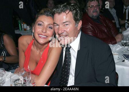 French actor Martin Lamotte and a guest attend the 'Trophees de la Nuit' held at the Lido in Paris, France, on November 14, 2005. Photo by Benoit Pinguet/ABACAPRESS.COM Stock Photo