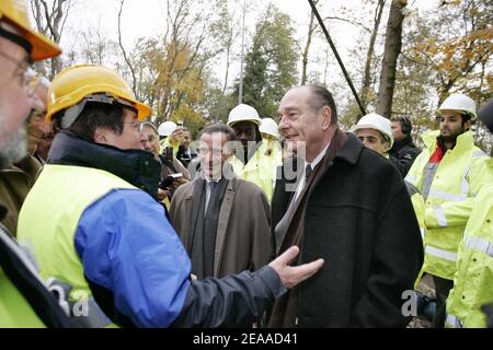 French President Jacques Chirac with Veolia Environnement CEO Henri Proglioa speaks to teachers and apprentice students preparing a health and environment high school diploma during a visit to Veolia Environnement vocational training centre in Jouy-le-Moutier, Paris suburb, France, on November 24, 2005. Photo by ABACAPRESS.COM Stock Photo