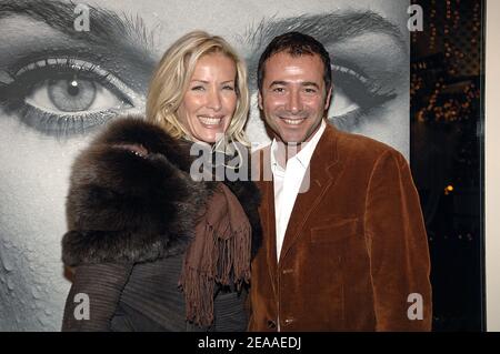 Agathe de La Fontaine and daughter Zoe at the launch party of UNICEF  calendar 2006, with picture of Diane Kruger, photographied by Christophe  Meimoon, held at the Bristol Hotel in Paris, France