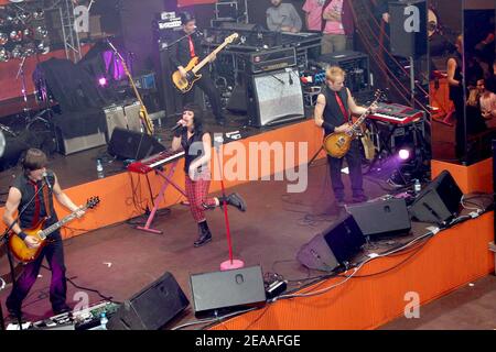 EXCLUSIVE. Superbus singer Jennifer Ayache (Chantal Lauby's daughter) performs live on stage during MTV party at the club 'Le Mix' in Paris, France, on december 6, 2005. Photo by Benoit Pinguet/ABACAPRESS.COM Stock Photo